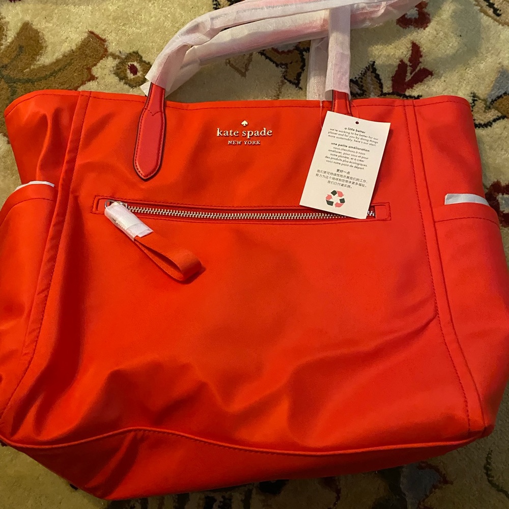 Kate spade reactive with luggage strap